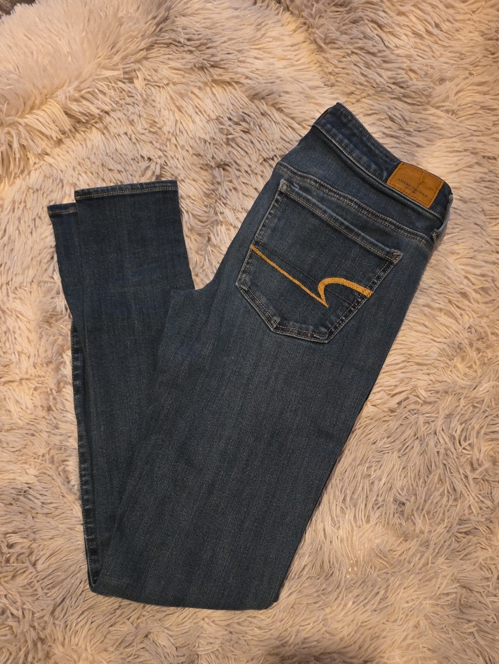 American Eagle Outfitters Dark Blue Denim Jeans with Gold Stitching